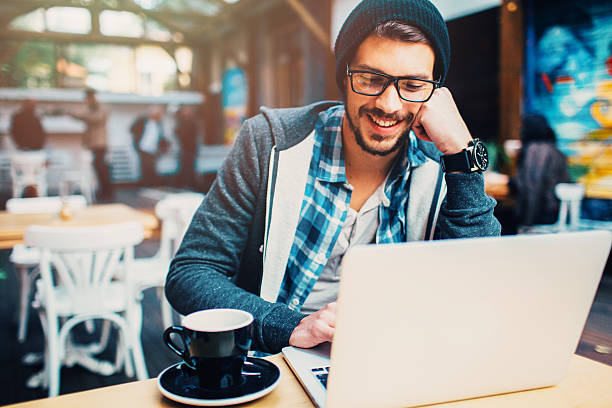 Coffee break Man having a break in a coffee with a laptop. hipster person stock pictures, royalty-free photos & images
