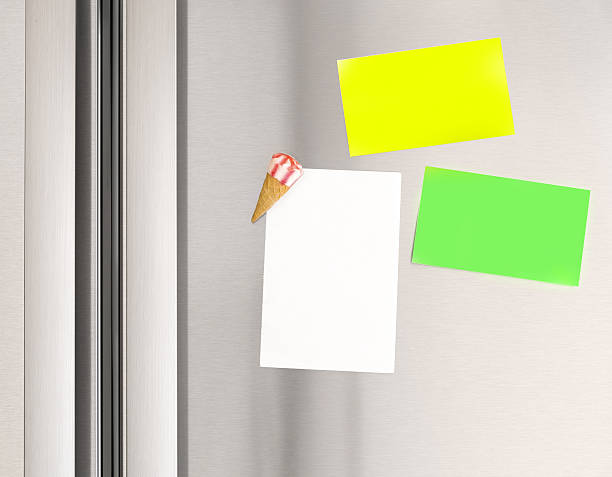 Sticky notes on the fridge Colorful sticky notes on the fridge at home, abstract domestic background, paper for message, communication concept magnet photos stock pictures, royalty-free photos & images