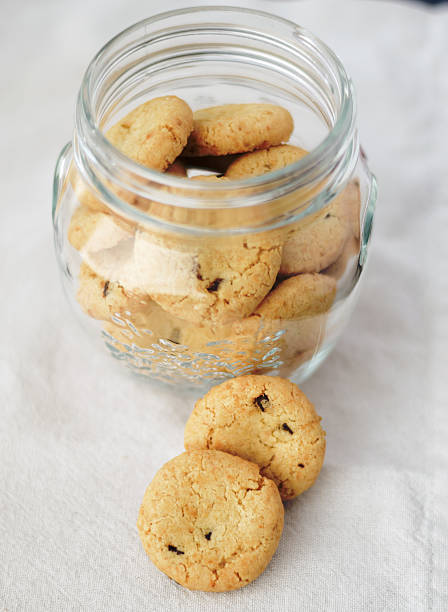 istock Cookies in glass jar on white 491714884