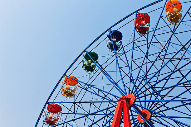istock Ferris wheel on a bright sunny day 491725555