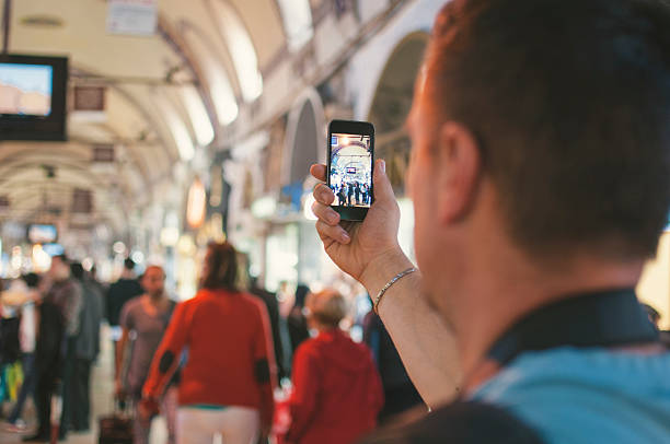 istock Tourist photographing bazaar in Istanbul 491725784