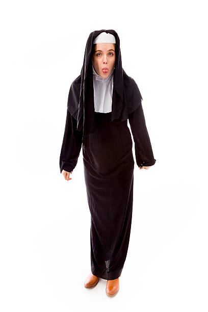 istock Young nun sticking out her tongue 491726835