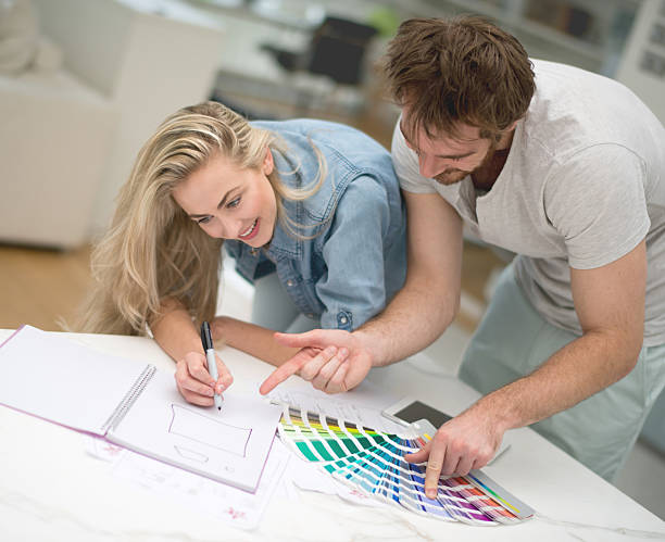 istock Young couple remodelling their house 491727536