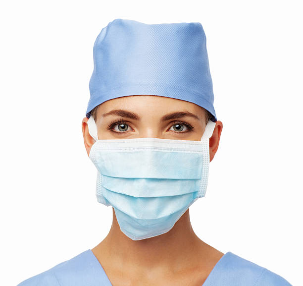 istock Surgeon Wearing Surgical Mask And Cap 491728529