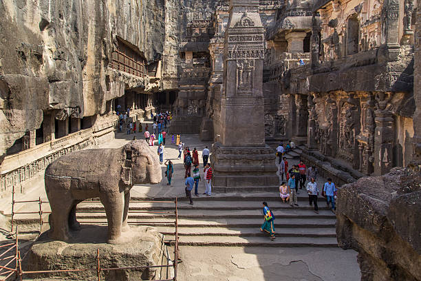 Kailasa Temple Ellora, India - January 14, 2015: North side of Kailasa temple part of Ellora Caves, with people sightseeing. Also known as Kailasanatha temple one of biggest rock-cut ancient Hindu temples. aurangabad maharashtra photos stock pictures, royalty-free photos & images