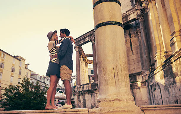 Shot of a young couple hugging while walking through a foreign cityhttp://195.154.178.81/DATA/i_collage/pu/shoots/805704.jpg