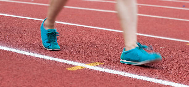 istock Running on the red running track 491729479