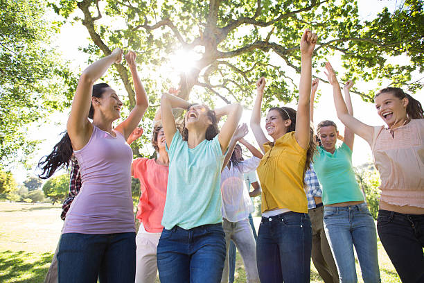 istock Happy friends in the park cheering 491729824
