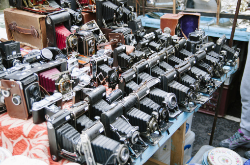 London, England - November 2, 2013: Many vintage cameras on a stall at the Portobello Road Market in London.
