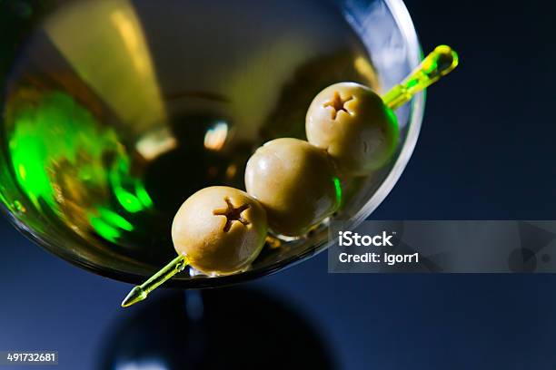 Martini With Green Olives Stock Photo - Download Image Now - Alcohol - Drink, Bar - Drink Establishment, Black Color