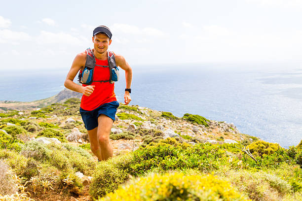 istock Mountain running man in inspirational landscape 491732756