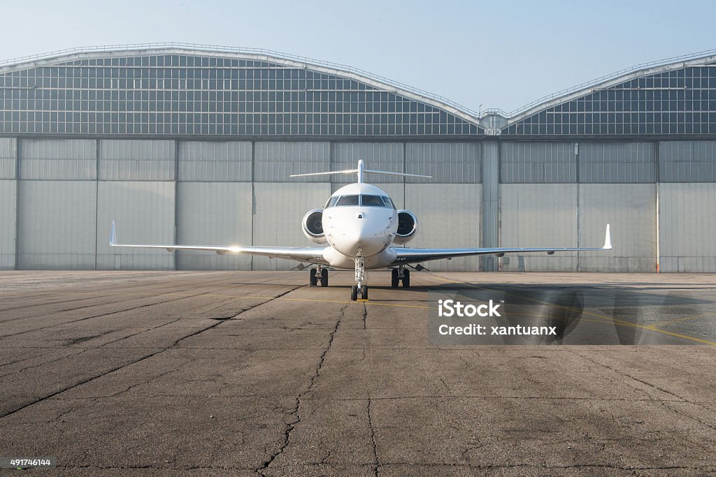 Business jet plane on the ground. Privacy Stock Photo