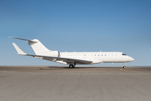 Bella Bella, Canada - April 24, 2021. A small passenger aircraft operated by Pacific Coastal Airlines, a regional airline within BC, arrives in the remote coastal community of Bella Bella.