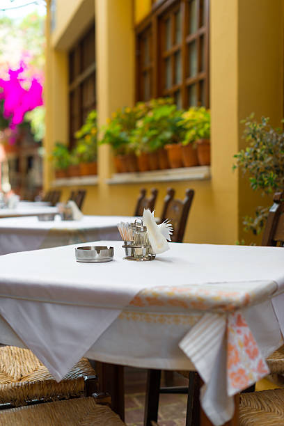 istock Mediterranean restaurant terrace exterior with chairs. 491747618