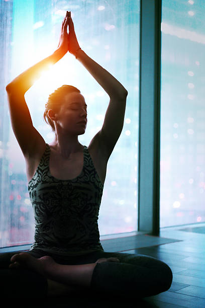 istock Woman doing yoga exercise 491751266