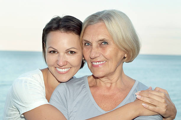 istock aged and young women 491760526