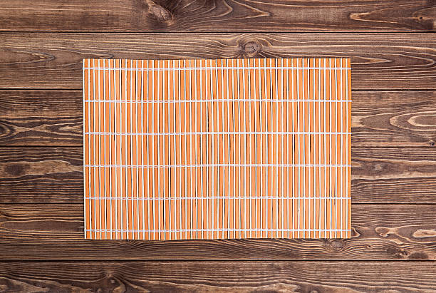 istock bamboo napkin on wooden table. top view 491761446