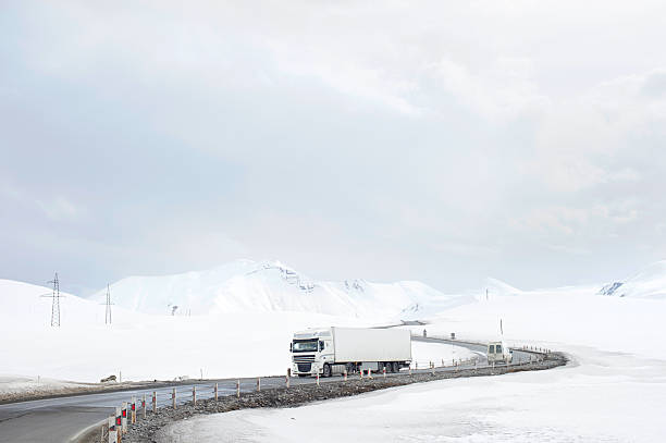 istock Car in a snow mountains 491763534