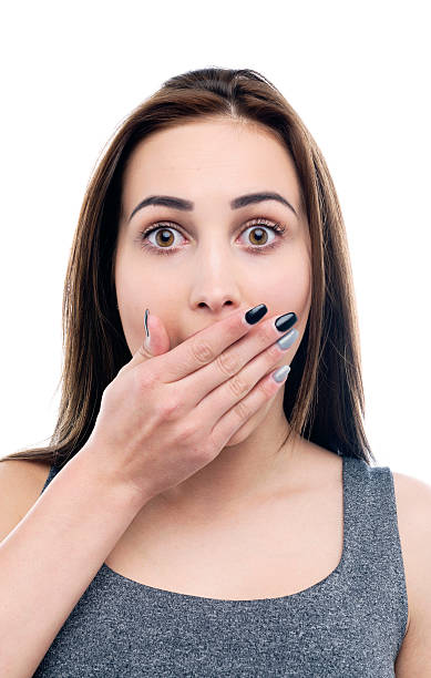 istock young woman doing hush gesrute 491765598
