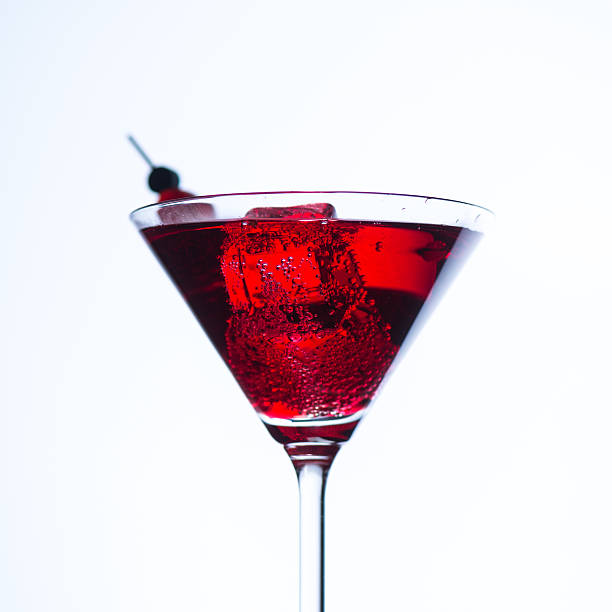 istock Fire blowing out of martini glass/close-up with white background 491767972