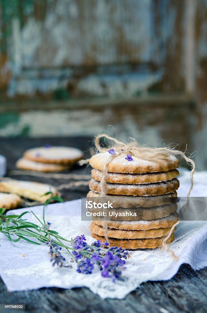 Shortbread Sable Shortbread Sable with lavender on a wooden background Lavender - Plant Stock Photo