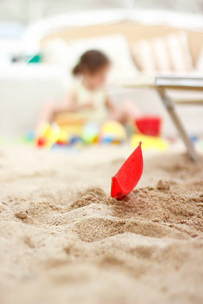 Girl playing on the beach