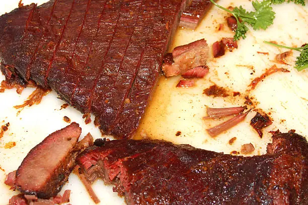 Photo of BBQ brisket sliced on a cutting board