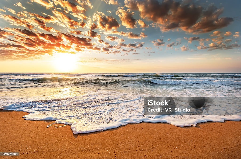 Brilliant ocean beach sunrise. 2015 Stock Photo
