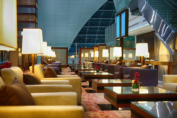 Dubai, Unted Arab Emirates - April 7, 2013: Dubai International Airport business lounge interior. Dubai International Airport is a major international airport located in Dubai, and is the world's busiest airport by international passenger traffic. It is a major airline hub in the Middle East, and is the main airport of Dubai.