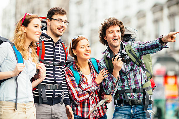 istock Happy backpackers enjoying city and photography 491782449