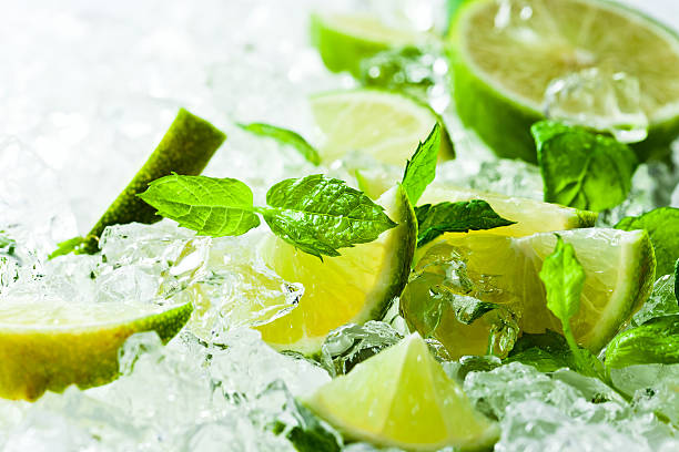 istock lime and leaves of mint with ice 491783399