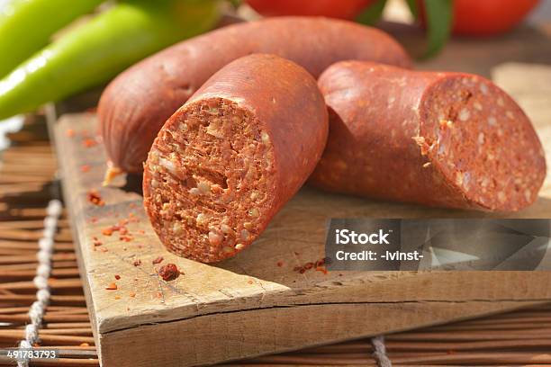 Sucuk On A Cutting Board Stock Photo - Download Image Now - Aleppo Pepper, Close-up, Cross Section