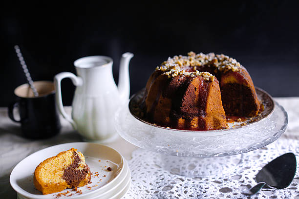 Gugelhupf bundt marble cake with caramel and nuts stock photo