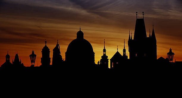 istock Prague silhouettes from Charles Bridge before dawn 491786353