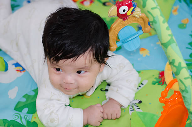 istock five months baby and toys 491787529