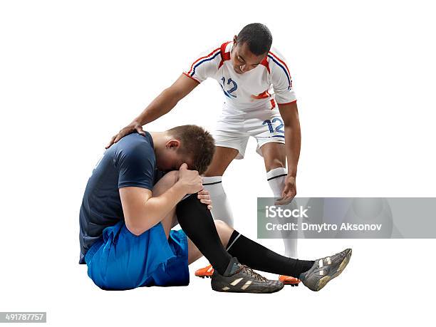 Giocatore Di Calcio Di Lesioni Isolate - Fotografie stock e altre immagini di Adolescente - Adolescente, Adulto, Allenamento