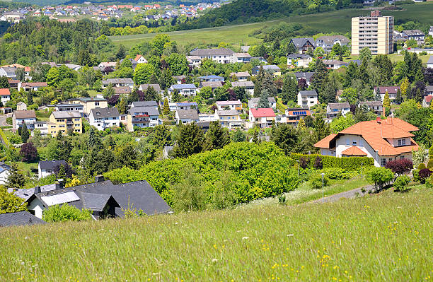 istock Village in lush green valley 491787875