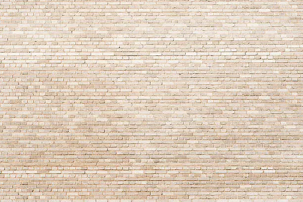 Background of creamy, tiny bricks texture.
