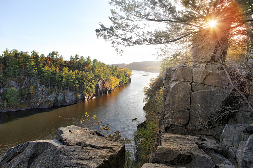 Autumn Sunset On The St. Croix River at Taylor's Falls, a very popular rock climbing location. Shot from the top of a very tall cliff.