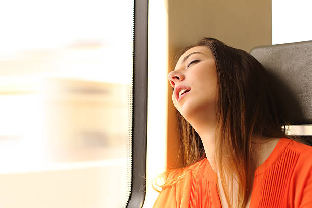 istock Traveler sleeping in a train travel 491803796