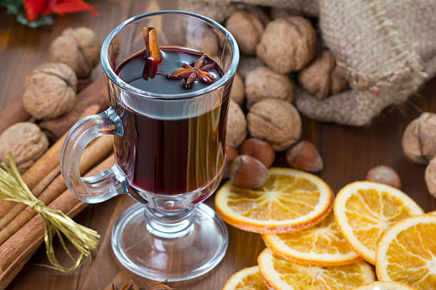 istock Mulled wine, cinnamon sticks, nuts and dried orange slices 491804104