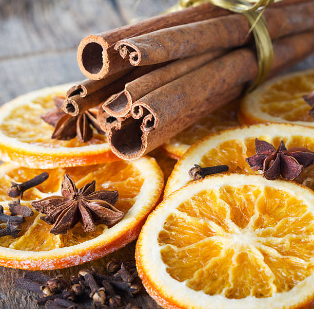 istock cinnamon sticks, anise and dried orange slices 491804516