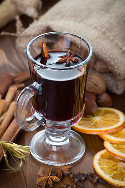 istock Mulled wine, cinnamon sticks, nuts and dried orange slices 491804826