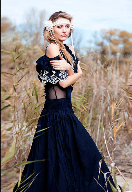 istock girl national clothes in the forest 491805798