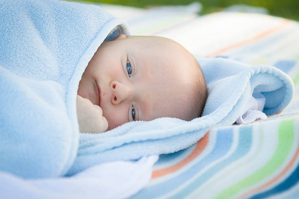 istock Little Baby Boy Resting in His Warm Blanket 491810570