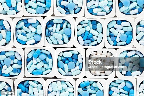 Blue And White Pills Stock Photo - Download Image Now - 2015, Abundance, Addiction