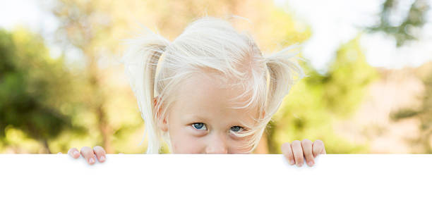 istock Cute Little Girl Holding White Board with Room For Text 491813018