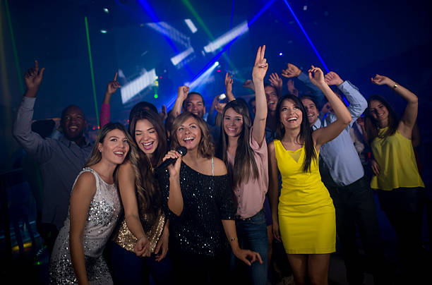istock Friends singing on a girl's night out 491815388