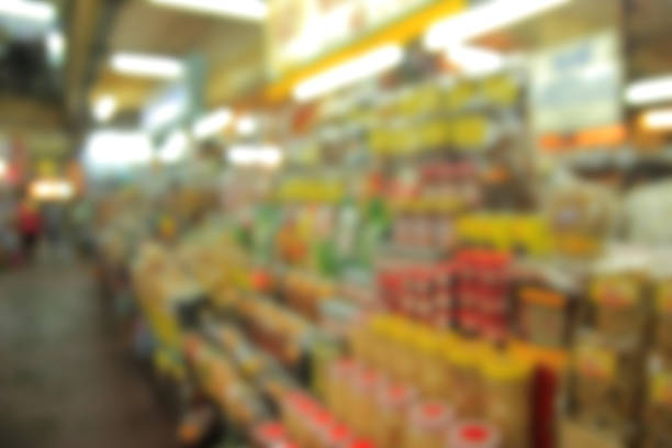 istock blurred image market and people shopping. 491815570