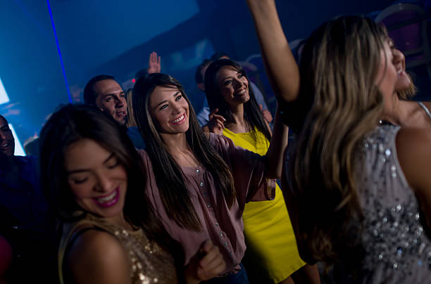 istock Group of people dancing at a nightclub 491816028